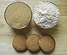 Cookies in front of bowls of amaranth seeds and amaranth flour