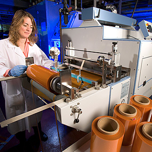 ARS scientist casting carrot wrap into rolls