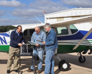 Agricultural engineer Chenghai Yang with technician Fred Gomez (center) and pilot Lee Denham