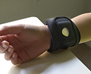 Wristband monitor on study participant.